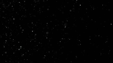 White-Snow-Falling-on-Isolated-Black-Background