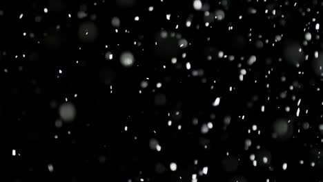 White-Snow-Falling-on-Isolated-Black-Background