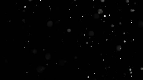 White-Snow-Falling-on-Isolated-Black-Background