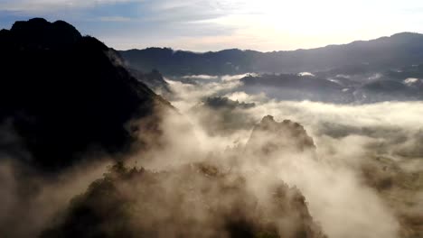 Aerial-view-of-Morning-mist-at-mountains.