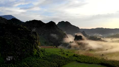 Aerial-view-of-Morning-mist-at-mountains.