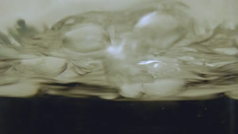 Underwater-Bubbles-Rising-to-Water's-Surface-2