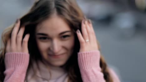 Close-up-portrait---woman-laughing-in-city-street