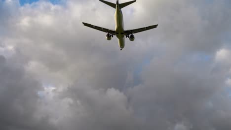 Airplane-landing-at-illuminated-runway