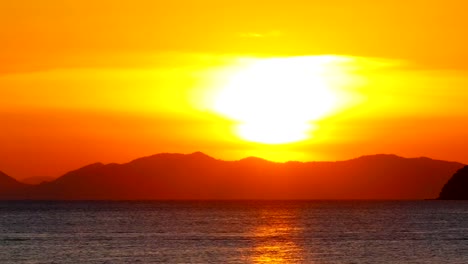 Long-tail-boats-in-the-sea-at-sunset