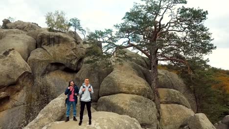 Happy-Backpackers-on-Rocks