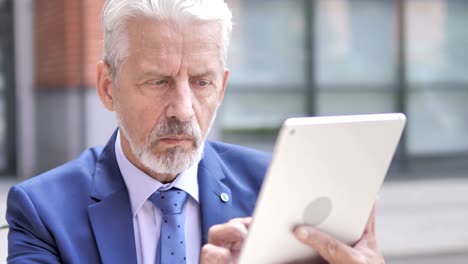 Old-Businessman-Using-Tablet,-Outdoor