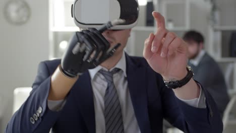 Businessman-with-Bionic-Prosthetic-Hand-Using-VR-Headset