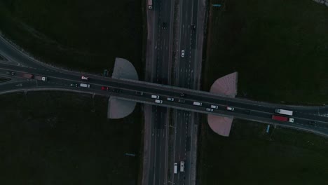 Night-Aerial-view-of-highway-and-overpass-in-city.