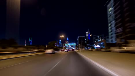 Drive-through-the-traffic-in-the-city-highway-timelapse-hyperlapse-in-Kuwait.-Kuwait,-Middle-East