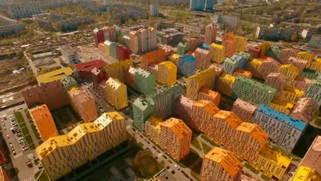 Flying-over-cozy-comfortable-colorful-buildings-in-a-European-city-4K-UHD-aerial