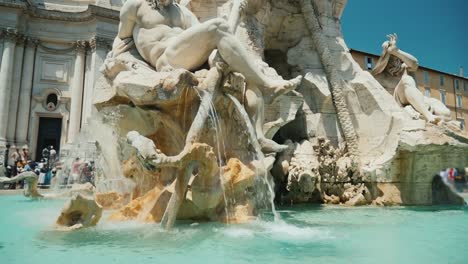 Tilt-shot:-Four-Rivers-fountain-in-Piazza-Navona-in-Rome-Italy