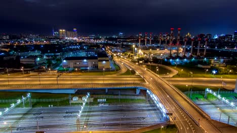 Moscow-timelapse,-night-view-of-the-third-transport-ring-and-the-central-part-of-Moscow's-rings,-traffic,-car-lights