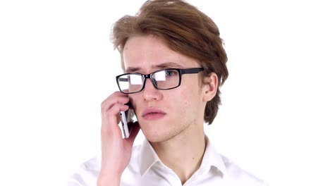 Man-in-Glasses-at-Work-Talking-on-Smartphone-with-Customer