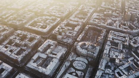 Cinematic-aerial-footage-of-old-city-center-and-opera-and-ballet-theatre-during-sunny-winter-day