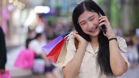 Asian-woman-using-mobile-phone