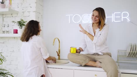 Girlfriends-have-fun-on-kitchen