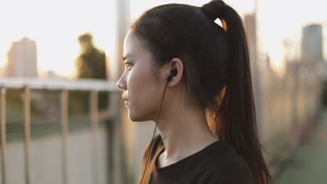 Beautiful-young-asian-woman-jogging-exercising-running.