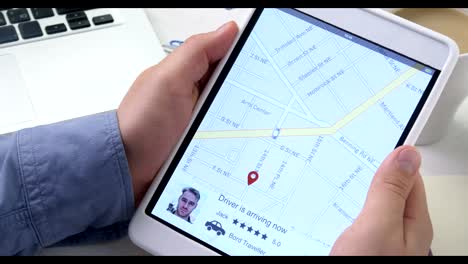 Using-car-sharing-app-on-the-digital-tablet.-Man-arrives-to-pick-up-his-passenger