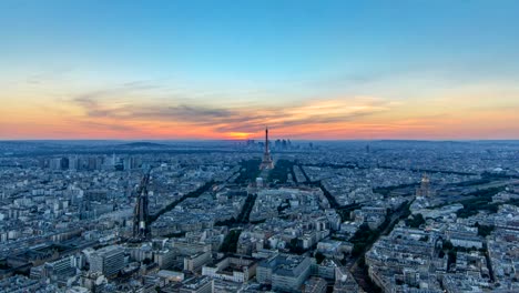 Panorama-of-Paris-at-sunset-timelapse.-Eiffel-tower-view-from-montparnasse-building-in-Paris---France