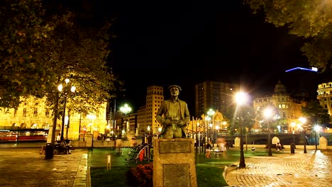 Statue-of-famous-writer-Balendin-Enbeita-Goiria-in-river-park-Bilbao,-Spain