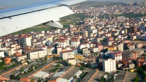 Fenster-Flugzeug-Stadt