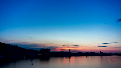 Day-to-night-time-lapse-of-the-Dnipro-river-in-the-Kyiv-at-sunset.