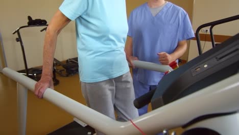 Elderly-Woman-Exercising-on-Treadmill-during-Physiotherapy-Session