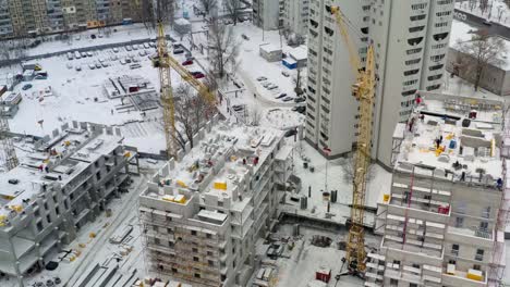 Aerial-view-of-building-construction-site-in-winter