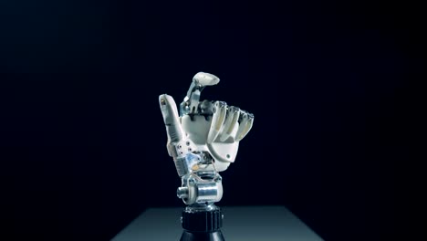 Robotic-arm-is-making-finger-gestures-after-getting-regulated-by-a-person