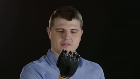 Man-Controlling-Fingers-on-Prosthetic-Arm