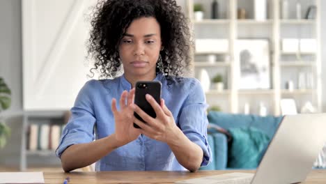 African-Woman-Using-Smartphone-Application