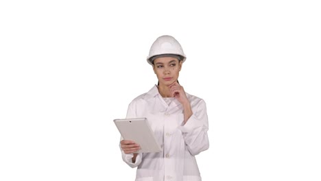 Woman-engineer-checking-information-and-objects-on-her-tablet-on-white-background