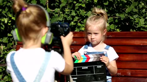 Little-girls-record-a-video-blog-on-the-camera.