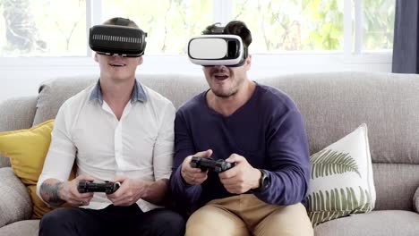 Gay-couple-relaxing-on-couch-playing-virtual-reality-games.-Exciting-mood.-Interesting-mood.