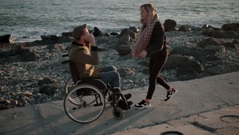 Girl-cheering-up-disabled-boyfriend