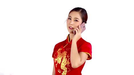 Young-Chinese-woman-talking-with-smartphone