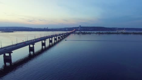 Cars-with-headlights-on-the-bridge