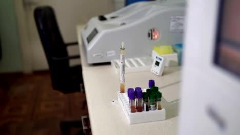 A-female-lab-assistant-is-preparing-blood-tests.-Modern-medical-technology.-Mtdicinal-lab.