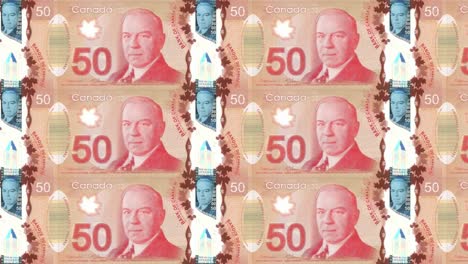 Banknotes-of-fifty-canadian-dollars-rolling-on-screen,-cash-money,-loop