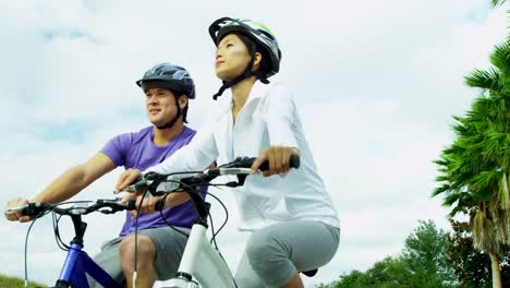 Asian-Chinese-young-couple-healthy-living-cycling-fitness