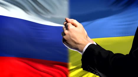 Russland-Sanktionen-Ukraine,-verkettete-Arme,-politischen-oder-wirtschaftlichen-Konflikt,-business