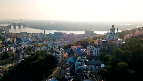 Lovely-Kiev-Ukraine.-Andrew's-Descent-old-street.-Panaramic-aerial-drone-sunrise-view.-Historical-center