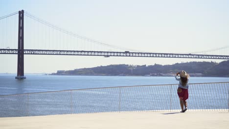 Girl-on-high-view-point-above-waterfront-in-Lisbon