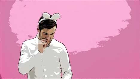 Young-man-standing-on-a-pink-background.-With-a-rabbit-ears.-Carrots-are-put-in-the-mouth-and-set-fire-to-the-ashtray.-Easter.