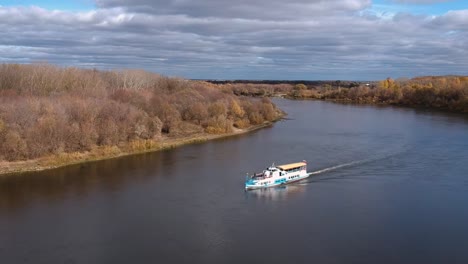 Aerial-view:-Tourist-boat-sails-on-the-Oka-river-near-Ryazan-in-autumn.