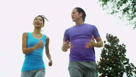 Happy-Ethnic-couple-enjoying-healthy-fitness-lifestyle-jogging