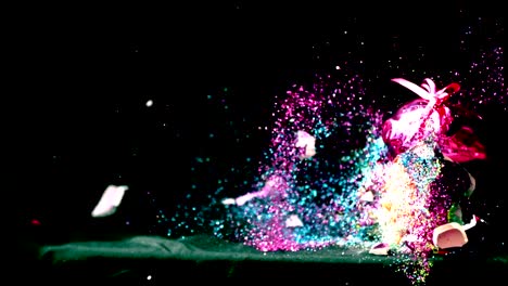 slow-motion-exploding-piggy-bank-glitter