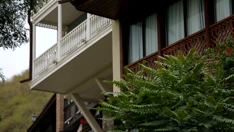 Traditional-wood-design-balcony-houses,-beautiful-exterior,-old-style-residence