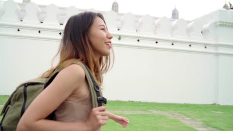 Slow-motion---Traveler-backpacker-Asian-women-lesbian-lgbt-couple-travel-in-Bangkok,-Thailand.-Happy-young-female-spending-holiday-trip-at-amazing-landmark-and-enjoy-her-journey-in-traditional-city.